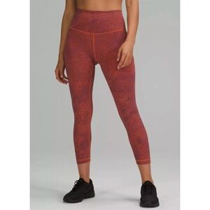 Lululemon Athletica Orange and Purple High-Waisted Leggings